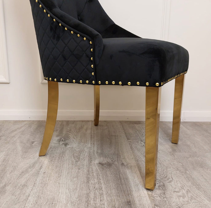 S3 Gold round Dinning Set (4 black Bentley dining chairs with gold studs and gold knockers)